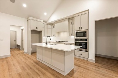 This home is truly a hole-in-one for those seeking a on Bella Vista Country Club - Scottsdale in Arkansas - for sale on GolfHomes.com, golf home, golf lot