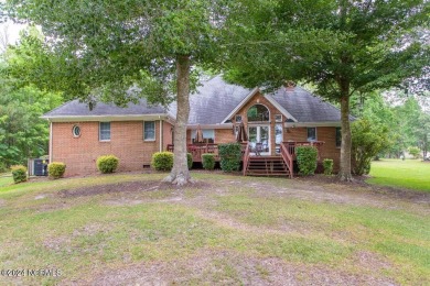 Waterfront home located on the water in a gated community called on Sound Golf Links at Albemarle Plantation in North Carolina - for sale on GolfHomes.com, golf home, golf lot