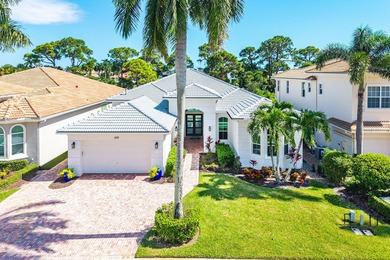 Discover luxury living at 326 Charroux Drive in prestigious on Frenchmans Reserve in Florida - for sale on GolfHomes.com, golf home, golf lot