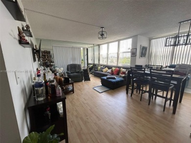 Large corner unit rarely available with a golf and garden view on Pembroke Lakes Golf Club in Florida - for sale on GolfHomes.com, golf home, golf lot