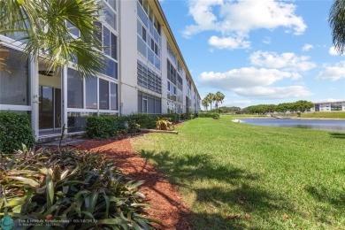Large 2/2 corner unit on the first floor with a beautiful on Wynmoor Golf Course in Florida - for sale on GolfHomes.com, golf home, golf lot