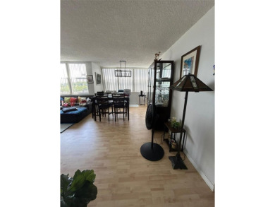 Large corner unit rarely available with a golf and garden view on Pembroke Lakes Golf Club in Florida - for sale on GolfHomes.com, golf home, golf lot