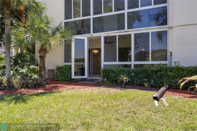 Large 2/2 corner unit on the first floor with a beautiful on Wynmoor Golf Course in Florida - for sale on GolfHomes.com, golf home, golf lot