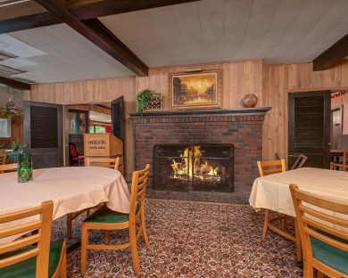 The nostalgic 3 season main lodge at the Froelich's Sayner Lodge on Plum Lake Golf Club in Wisconsin - for sale on GolfHomes.com, golf home, golf lot