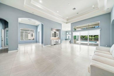 Discover luxury living at 326 Charroux Drive in prestigious on Frenchmans Reserve in Florida - for sale on GolfHomes.com, golf home, golf lot
