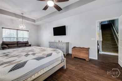 Spacious 5-bed, 3-bath home w/ a 3-car garage on over an acre in on Lost Plantation Golf Club in Georgia - for sale on GolfHomes.com, golf home, golf lot