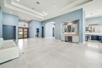 Discover luxury living at 326 Charroux Drive in prestigious on Frenchmans Reserve in Florida - for sale on GolfHomes.com, golf home, golf lot