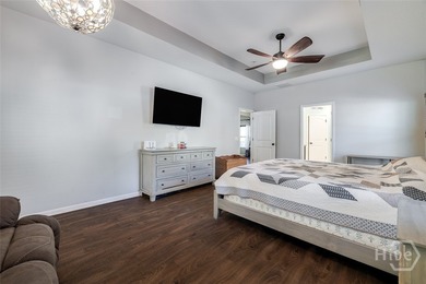 Spacious 5-bed, 3-bath home w/ a 3-car garage on over an acre in on Lost Plantation Golf Club in Georgia - for sale on GolfHomes.com, golf home, golf lot