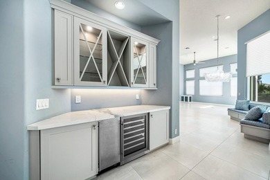 Discover luxury living at 326 Charroux Drive in prestigious on Frenchmans Reserve in Florida - for sale on GolfHomes.com, golf home, golf lot