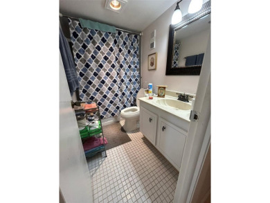 Large corner unit rarely available with a golf and garden view on Pembroke Lakes Golf Club in Florida - for sale on GolfHomes.com, golf home, golf lot