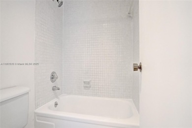 Large corner unit rarely available with a golf and garden view on Pembroke Lakes Golf Club in Florida - for sale on GolfHomes.com, golf home, golf lot