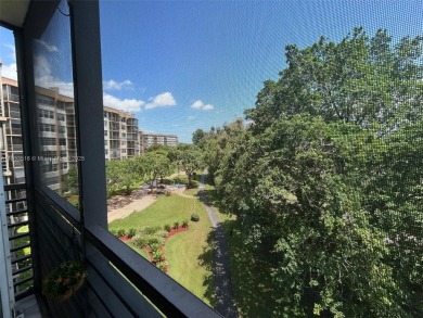 Large corner unit rarely available with a golf and garden view on Pembroke Lakes Golf Club in Florida - for sale on GolfHomes.com, golf home, golf lot