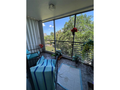 Large corner unit rarely available with a golf and garden view on Pembroke Lakes Golf Club in Florida - for sale on GolfHomes.com, golf home, golf lot
