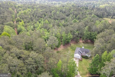 Welcome home to peaceful living in this well maintained 3 Br/2 on Fairfield Plantation Golf and Country Club in Georgia - for sale on GolfHomes.com, golf home, golf lot