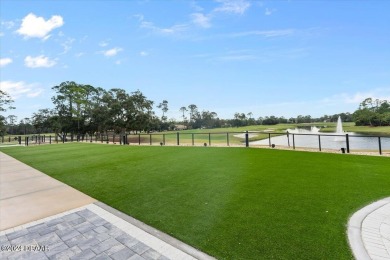 ENJOY EXQUISITE LUXURY LIVING IN THIS STUNNING 3-BEDROOM 3.5 on Plantation Bay Golf and Country Club in Florida - for sale on GolfHomes.com, golf home, golf lot