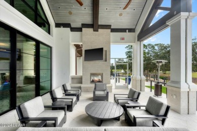 ENJOY EXQUISITE LUXURY LIVING IN THIS STUNNING 3-BEDROOM 3.5 on Plantation Bay Golf and Country Club in Florida - for sale on GolfHomes.com, golf home, golf lot