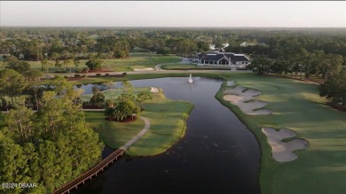 ENJOY EXQUISITE LUXURY LIVING IN THIS STUNNING 3-BEDROOM 3.5 on Plantation Bay Golf and Country Club in Florida - for sale on GolfHomes.com, golf home, golf lot