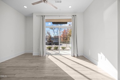 Lakeside living. First level condo conveniently situated on NCSU on Lonnie Poole Golf Course in North Carolina - for sale on GolfHomes.com, golf home, golf lot