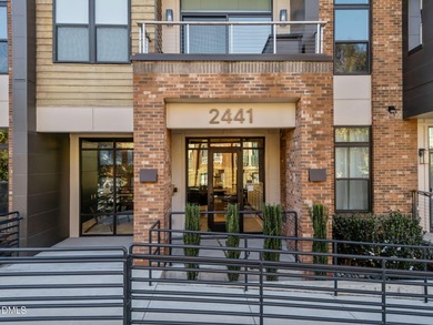 Lakeside living. First level condo conveniently situated on NCSU on Lonnie Poole Golf Course in North Carolina - for sale on GolfHomes.com, golf home, golf lot