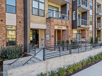 Lakeside living. First level condo conveniently situated on NCSU on Lonnie Poole Golf Course in North Carolina - for sale on GolfHomes.com, golf home, golf lot