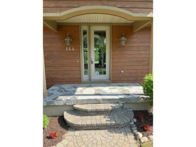 Spacious & comfortable Loon Lake golf course ranch with main on The Loon Golf Resort in Michigan - for sale on GolfHomes.com, golf home, golf lot