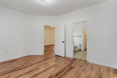 This is a beautifully upgraded end-unit 3-bedroom/2-bathroom on Heron Point Golf Club in South Carolina - for sale on GolfHomes.com, golf home, golf lot