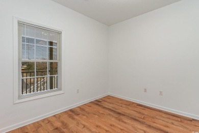This is a beautifully upgraded end-unit 3-bedroom/2-bathroom on Heron Point Golf Club in South Carolina - for sale on GolfHomes.com, golf home, golf lot