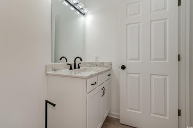 This is a beautifully upgraded end-unit 3-bedroom/2-bathroom on Heron Point Golf Club in South Carolina - for sale on GolfHomes.com, golf home, golf lot