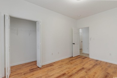 This is a beautifully upgraded end-unit 3-bedroom/2-bathroom on Heron Point Golf Club in South Carolina - for sale on GolfHomes.com, golf home, golf lot