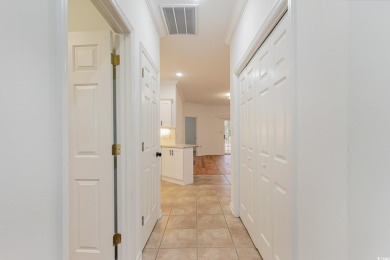 This is a beautifully upgraded end-unit 3-bedroom/2-bathroom on Heron Point Golf Club in South Carolina - for sale on GolfHomes.com, golf home, golf lot
