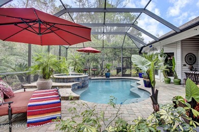 Private pool home in gated Orange Park Country Club backing to on Country Club of Orange Park in Florida - for sale on GolfHomes.com, golf home, golf lot