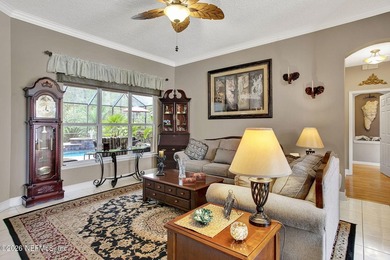 Private pool home in gated Orange Park Country Club backing to on Country Club of Orange Park in Florida - for sale on GolfHomes.com, golf home, golf lot