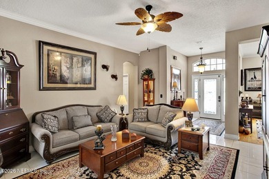 Private pool home in gated Orange Park Country Club backing to on Country Club of Orange Park in Florida - for sale on GolfHomes.com, golf home, golf lot