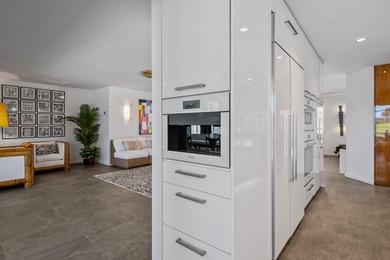 This stunning 5 Bedroom plus Den home overlooking the North Palm on North Palm Beach Country Club in Florida - for sale on GolfHomes.com, golf home, golf lot