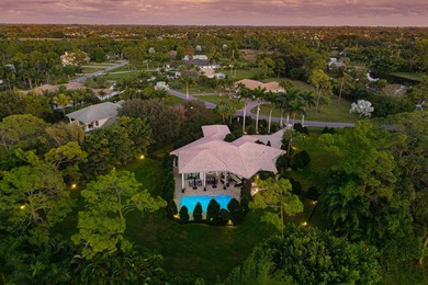 Nestled on 1.35 acres in the prestigious Sherbrooke Estates on Sherbrooke Golf and Country Club in Florida - for sale on GolfHomes.com, golf home, golf lot