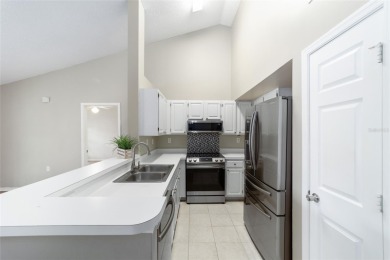 Welcome to this spacious 2nd-floor condo in The Links at Haile on Haile Plantation Golf and Country Club in Florida - for sale on GolfHomes.com, golf home, golf lot