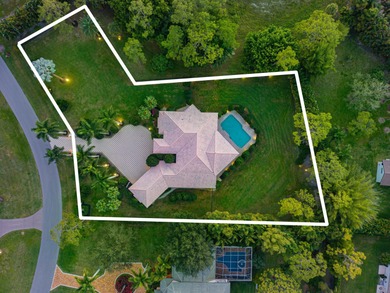 Nestled on 1.35 acres in the prestigious Sherbrooke Estates on Sherbrooke Golf and Country Club in Florida - for sale on GolfHomes.com, golf home, golf lot