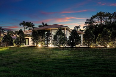 Nestled on 1.35 acres in the prestigious Sherbrooke Estates on Sherbrooke Golf and Country Club in Florida - for sale on GolfHomes.com, golf home, golf lot