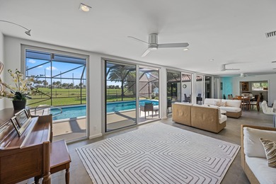 This stunning 5 Bedroom plus Den home overlooking the North Palm on North Palm Beach Country Club in Florida - for sale on GolfHomes.com, golf home, golf lot