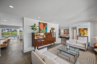 This stunning 5 Bedroom plus Den home overlooking the North Palm on North Palm Beach Country Club in Florida - for sale on GolfHomes.com, golf home, golf lot