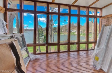 Welcome to an amazing opportunity at Lake Mohawk-This charming on Lake Mohawk Golf Club in Ohio - for sale on GolfHomes.com, golf home, golf lot