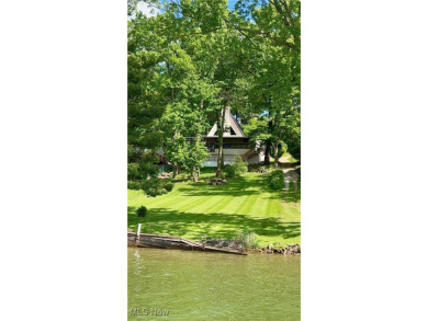 Welcome to an amazing opportunity at Lake Mohawk-This charming on Lake Mohawk Golf Club in Ohio - for sale on GolfHomes.com, golf home, golf lot