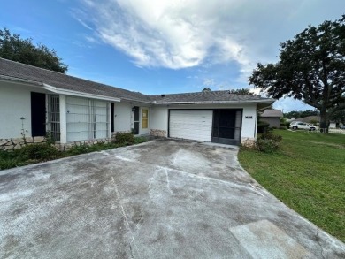 PRICE CORRECTION!!! HUGE OPPORTUNITY!!! 3 Bedroom 2 Bathroom on The Grand Club - Pine Lakes Course in Florida - for sale on GolfHomes.com, golf home, golf lot