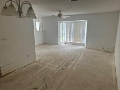 PRICE CORRECTION!!! HUGE OPPORTUNITY!!! 3 Bedroom 2 Bathroom on The Grand Club - Pine Lakes Course in Florida - for sale on GolfHomes.com, golf home, golf lot