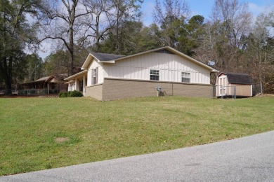 Step into 429 Golf View, where classic charm seamlessly meets on Jackson Links Golf Course in Alabama - for sale on GolfHomes.com, golf home, golf lot