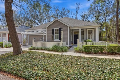 Tucked into the charming Hickory Walk enclave of Haile on Haile Plantation Golf and Country Club in Florida - for sale on GolfHomes.com, golf home, golf lot