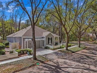 Tucked into the charming Hickory Walk enclave of Haile on Haile Plantation Golf and Country Club in Florida - for sale on GolfHomes.com, golf home, golf lot