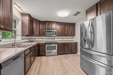 Welcome to this stunning, fully renovated 3-bedroom, 1.5-bath on Osceola Municipal Golf Course in Florida - for sale on GolfHomes.com, golf home, golf lot