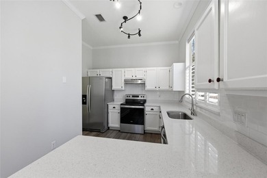 Tucked into the charming Hickory Walk enclave of Haile on Haile Plantation Golf and Country Club in Florida - for sale on GolfHomes.com, golf home, golf lot