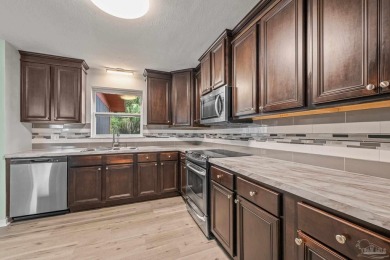 Welcome to this stunning, fully renovated 3-bedroom, 1.5-bath on Osceola Municipal Golf Course in Florida - for sale on GolfHomes.com, golf home, golf lot